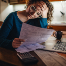 woman looking at important papers